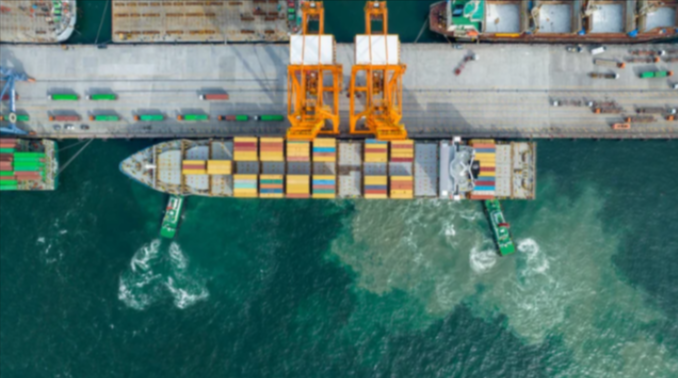 Service-Page-TikTok-Shop-Fulfillment-That-Works-Google-Docs-07-17-2025_11_34_AM A large cargo ship being pushed against the dock by green tug boats.